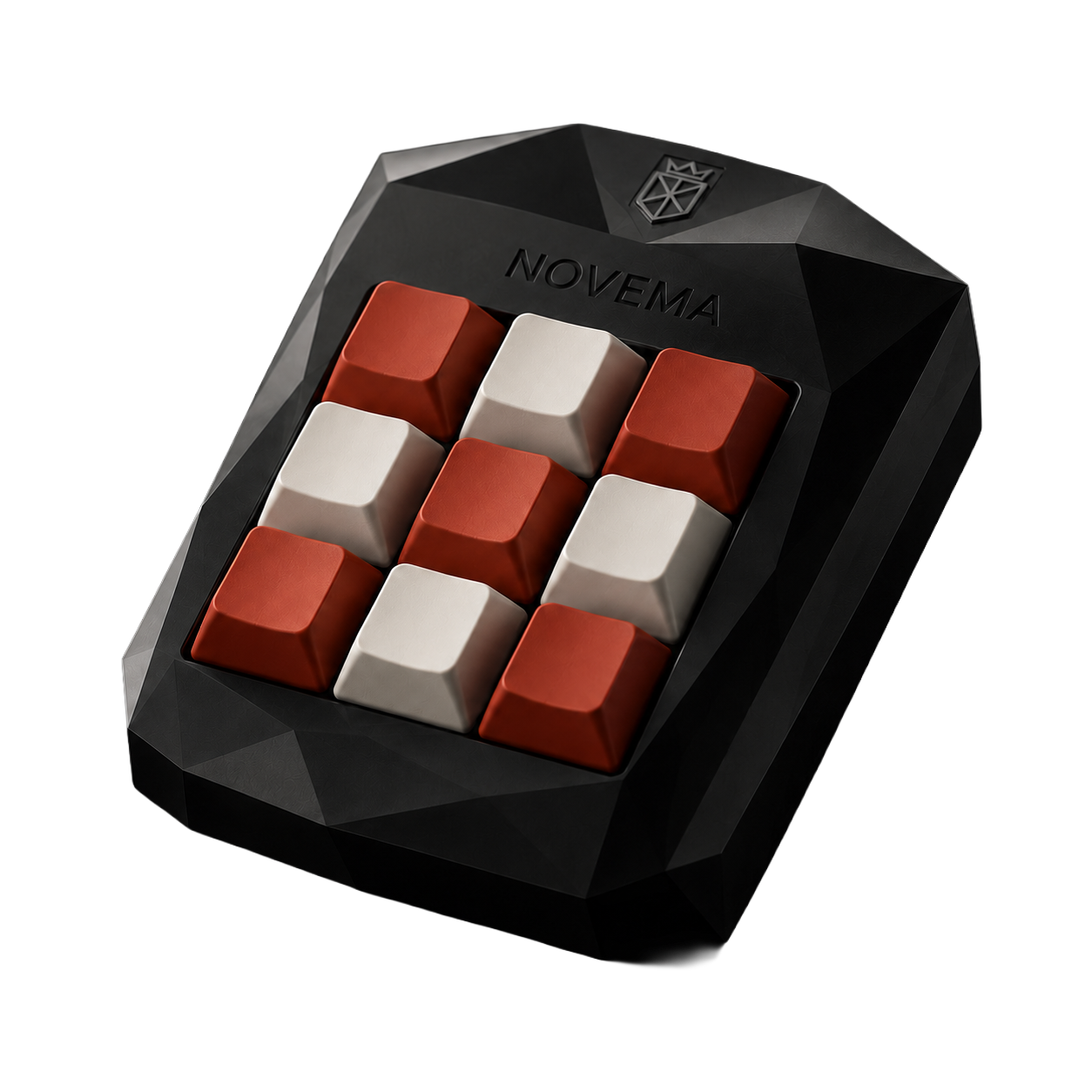 NOVEMA Claude Keypad — a faceted black 9-key macropad with red and bone keycaps